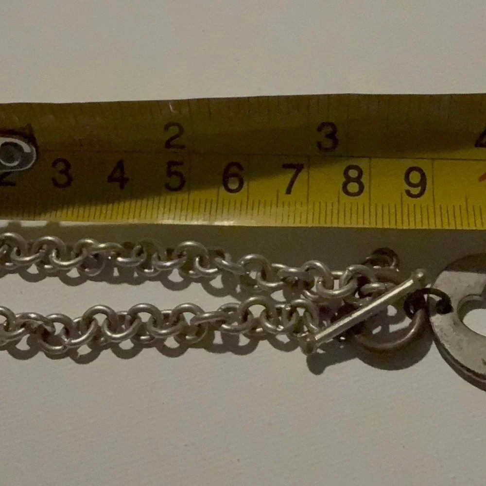 Vintage #1 sister chain bracelet with barbell closure. Printed on both sides